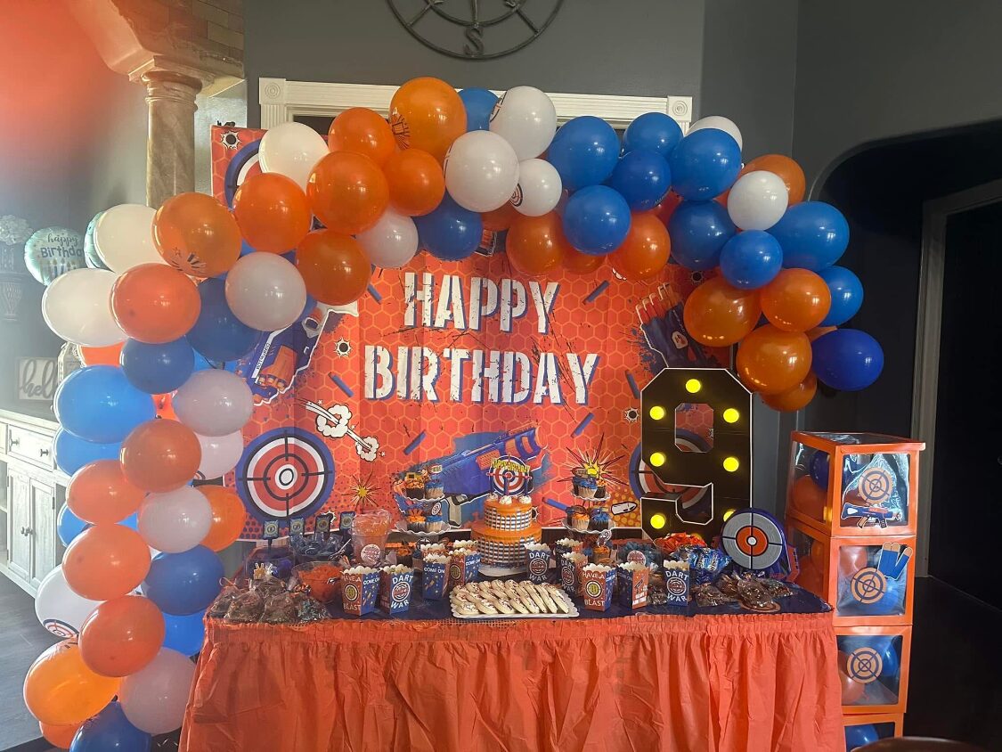 Nerf dart themed birthday backdrop