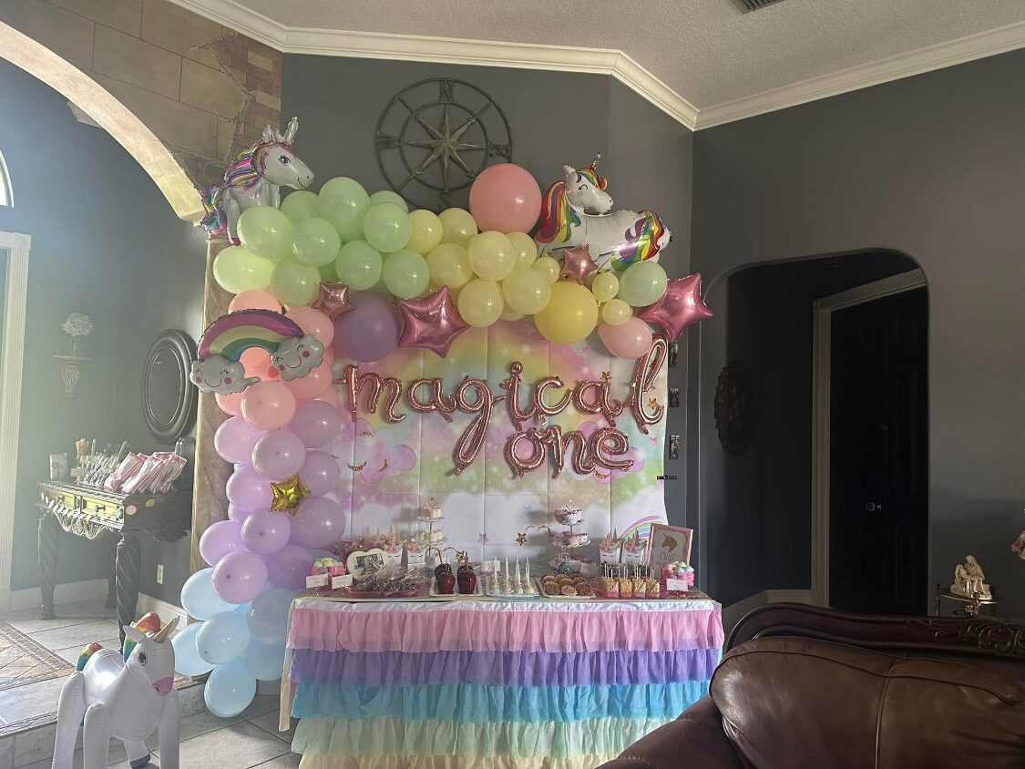 Unicorn themed "Magical One" first birthday setup